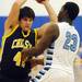 Chelsea's Michael Steinhauer holds the ball around Skyline's Jarrius Mann during the first half at Skyline on Tuesday night.  Melanie Maxwell I AnnArbor.com